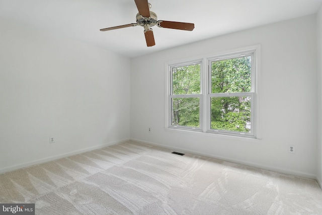 9116 John Way, Fairfax Station, VA 22039 - empty room featuring light carpet, ceiling fan, and baseboards