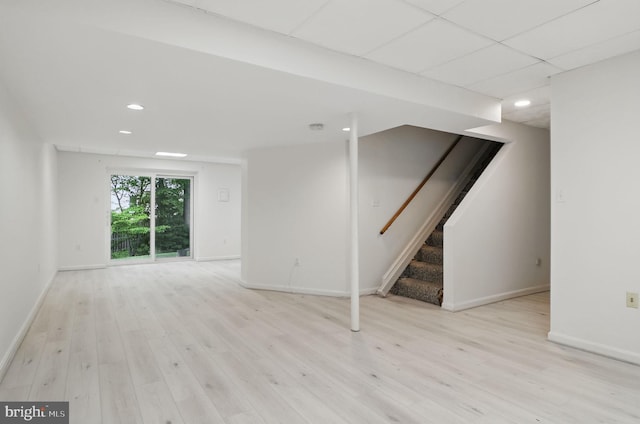 9116 John Way, Fairfax Station, VA 22039 - below grade area with baseboards, wood finished floors, stairway, and recessed lighting