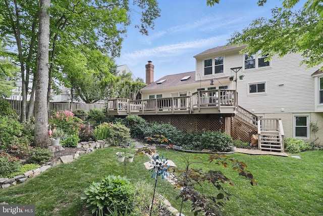 9116 John Way, Fairfax Station, VA 22039 - back of house with a wooden deck, stairway, and a chimney