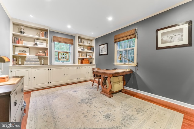 318 Longwood Rd, Kennett Square, PA 19348 - office area featuring light wood-style flooring, crown molding, built in shelves, recessed lighting, and baseboards