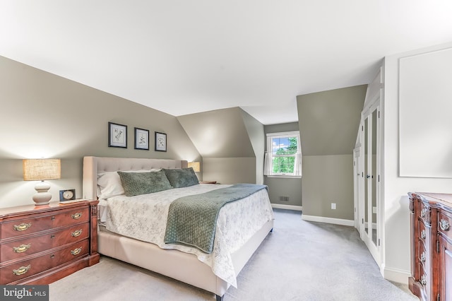 318 Longwood Rd, Kennett Square, PA 19348 - bedroom with baseboards, carpet floors, and vaulted ceiling