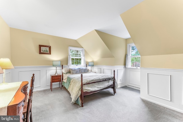 318 Longwood Rd, Kennett Square, PA 19348 - carpeted bedroom with a decorative wall, wainscoting, and lofted ceiling