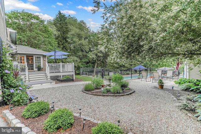 318 Longwood Rd, Kennett Square, PA 19348 - view of yard featuring a deck and a patio area