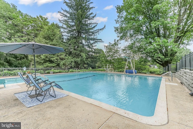 318 Longwood Rd, Kennett Square, PA 19348 - view of pool with a patio area and view of wooded area
