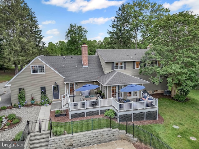 318 Longwood Rd, Kennett Square, PA 19348 - back of property featuring a wooden deck, a chimney, roof with shingles, a gate, and central air condition unit