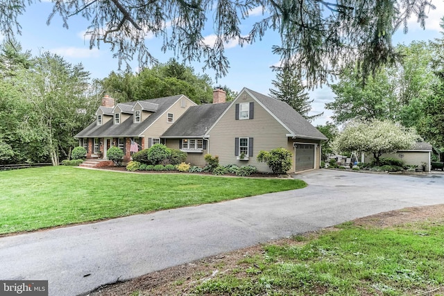 318 Longwood Rd, Kennett Square, PA 19348 - cape cod house with asphalt driveway, a chimney, a front lawn, and an attached garage
