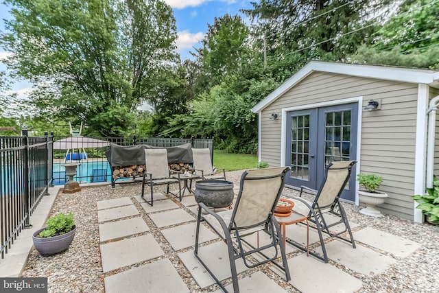 318 Longwood Rd, Kennett Square, PA 19348 - view of patio featuring french doors and an outdoor structure