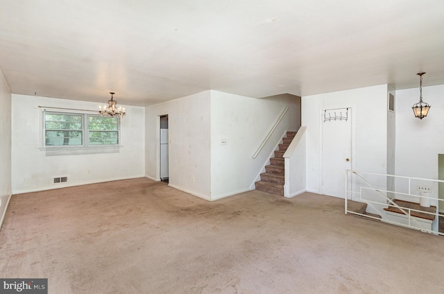 8809 Vernon View Dr, Alexandria, VA 22308 - unfurnished living room with a chandelier, carpet, baseboards, and stairway