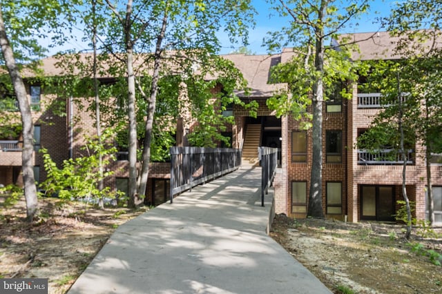 view of front of home with brick siding