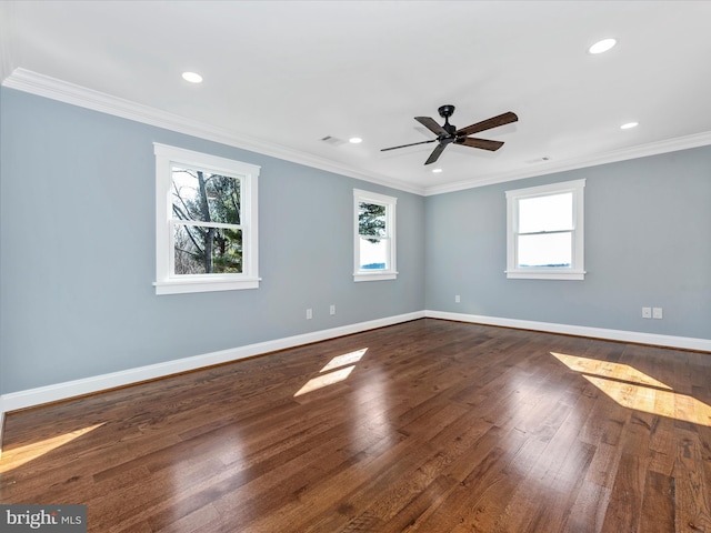 unfurnished room featuring a healthy amount of sunlight, recessed lighting, and dark wood-style flooring