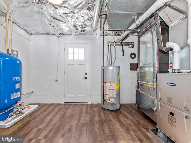 utility room with water heater
