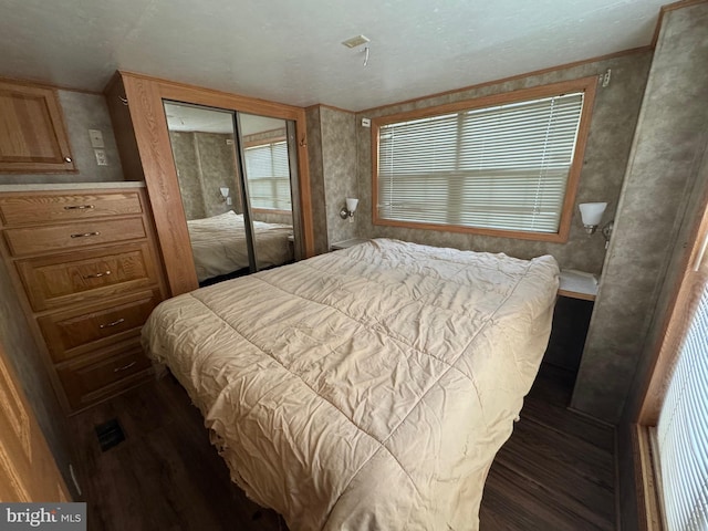 724 Monmouth Rd Unit 38, Cream Ridge, NJ 08514 - bedroom featuring a closet and wood finished floors