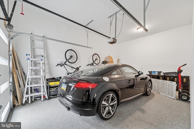 garage featuring a garage door opener