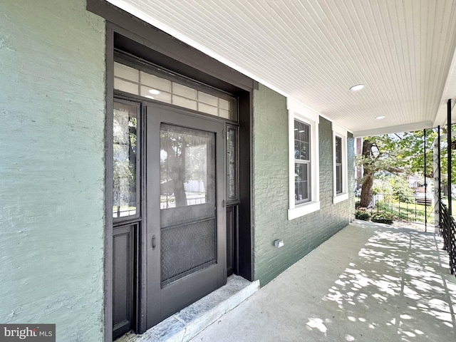 property entrance with a porch