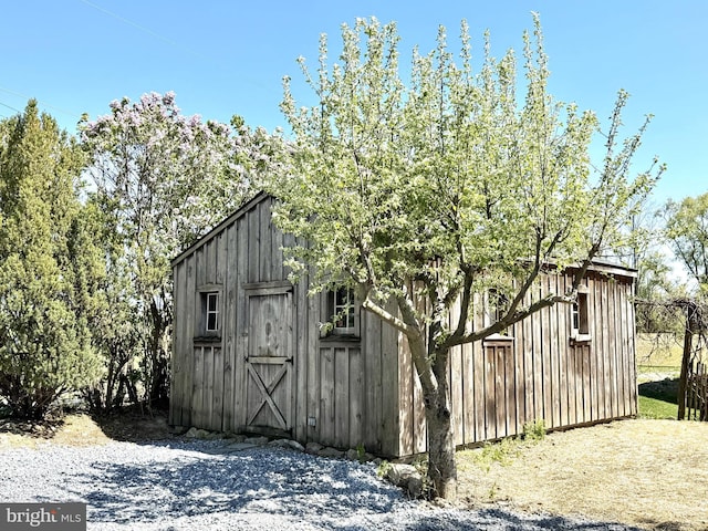 view of outbuilding with an outdoor structure