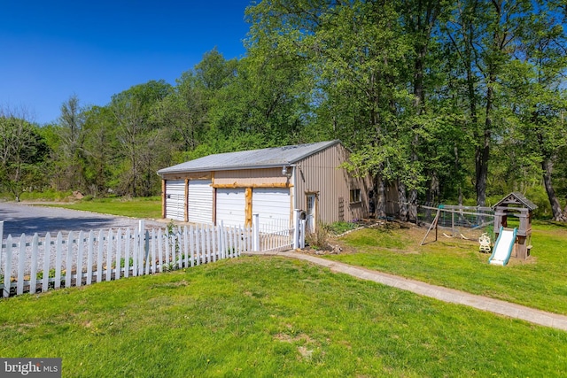 detached garage with fence
