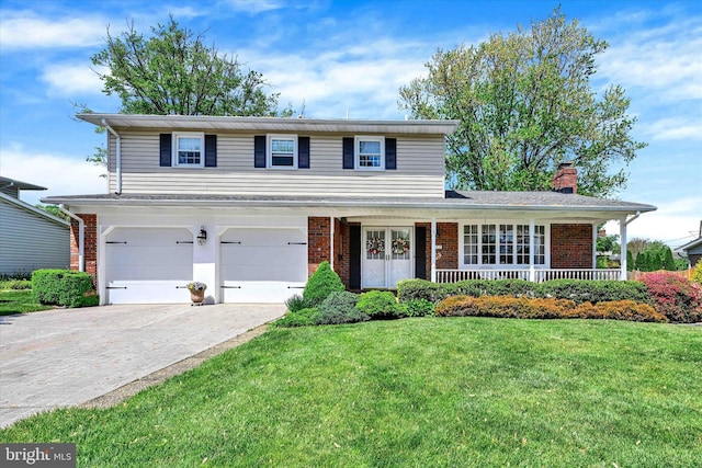 122 Tregarone Rd, Lutherville Timonium, MD 21093 - traditional-style house featuring an attached garage, driveway, a front lawn, and brick siding