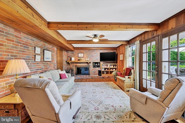 122 Tregarone Rd, Lutherville Timonium, MD 21093 - living area featuring a brick fireplace, brick wall, ceiling fan, and beam ceiling