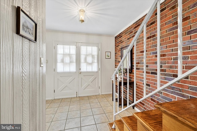 122 Tregarone Rd, Lutherville Timonium, MD 21093 - foyer featuring crown molding, light tile patterned floors, and stairway