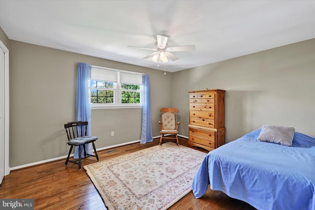 122 Tregarone Rd, Lutherville Timonium, MD 21093 - bedroom with visible vents, baseboards, ceiling fan, and wood finished floors
