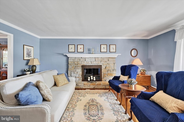 122 Tregarone Rd, Lutherville Timonium, MD 21093 - living area with a stone fireplace, ornamental molding, baseboards, and wood finished floors