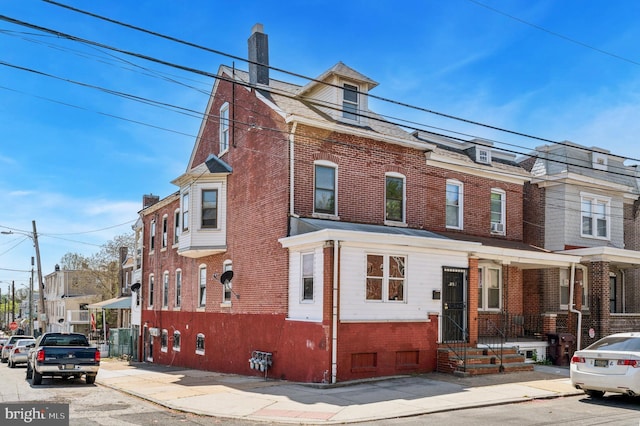 view of front of property with brick siding