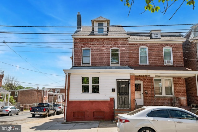 view of front of home with brick siding