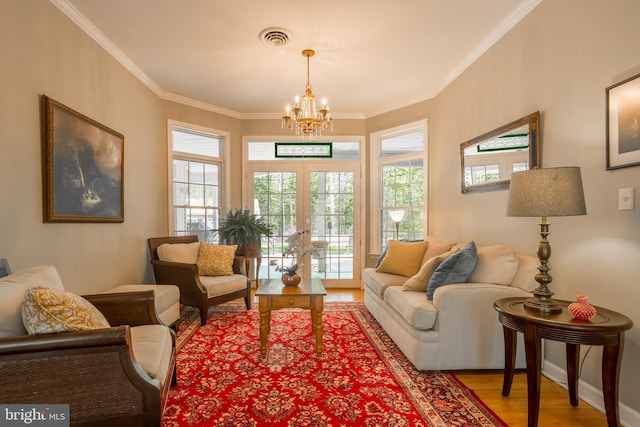7645 E Longfield Dr, Hebron, MD 21830 - sitting room with a chandelier, visible vents, ornamental molding, and light wood finished floors