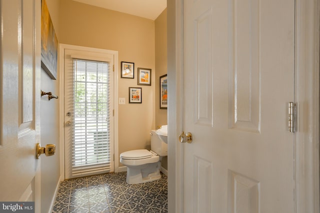 7645 E Longfield Dr, Hebron, MD 21830 - bathroom with toilet and baseboards