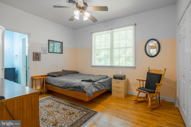 7645 E Longfield Dr, Hebron, MD 21830 - bedroom featuring a closet, a ceiling fan, and light wood-type flooring