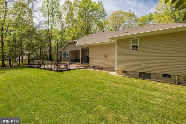 7645 E Longfield Dr, Hebron, MD 21830 - back of property with a lawn, crawl space, a shingled roof, and a deck
