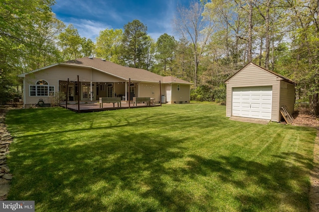 7645 E Longfield Dr, Hebron, MD 21830 - view of yard featuring a garage, an outbuilding, and a deck