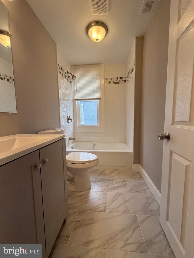 full bath featuring visible vents, vanity, toilet, marble finish floor, and shower / bathtub combination