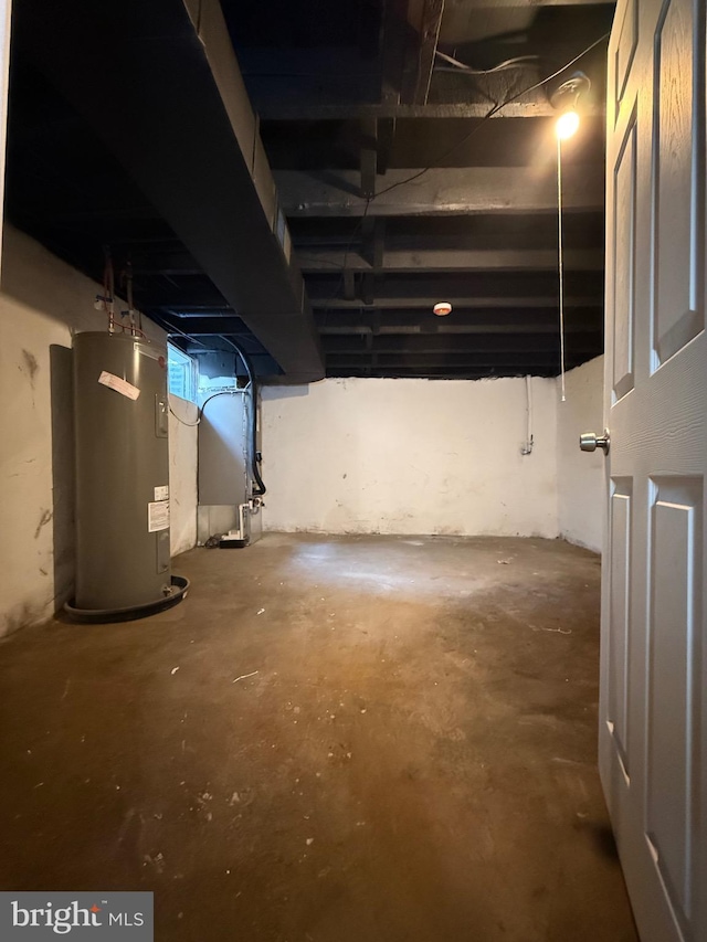 unfinished below grade area with water heater and heating unit