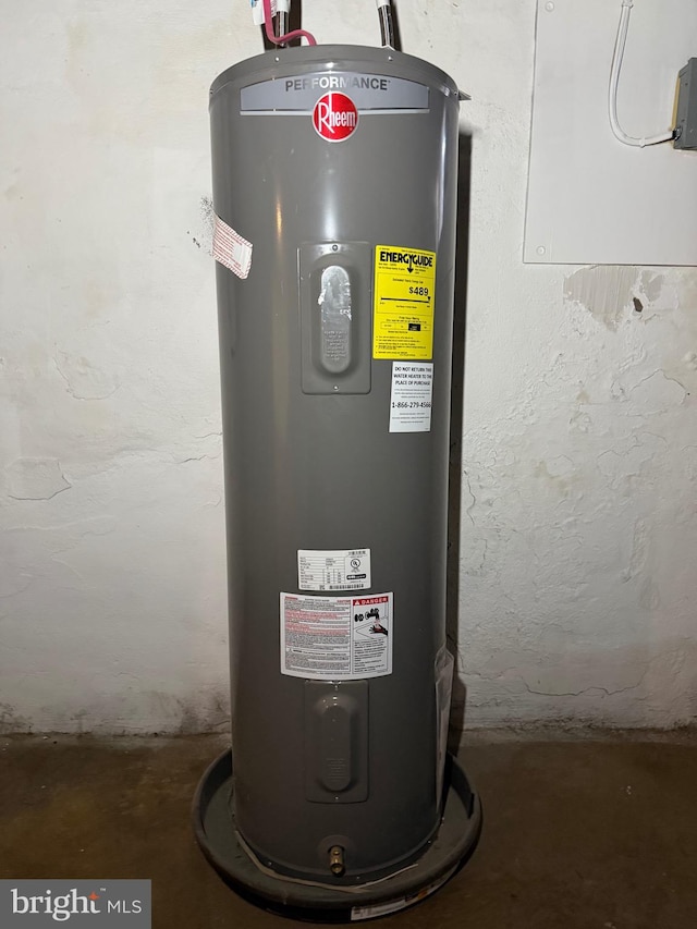 utility room with electric water heater