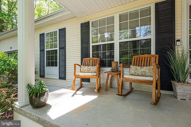 view of patio featuring a porch
