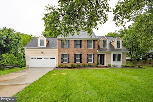 colonial-style house with driveway, an attached garage, and roof with shingles