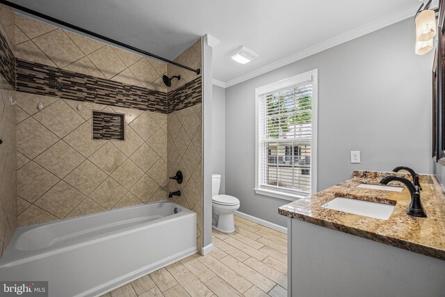 full bathroom with ornamental molding, toilet, baseboards, shower / bath combination, and double vanity