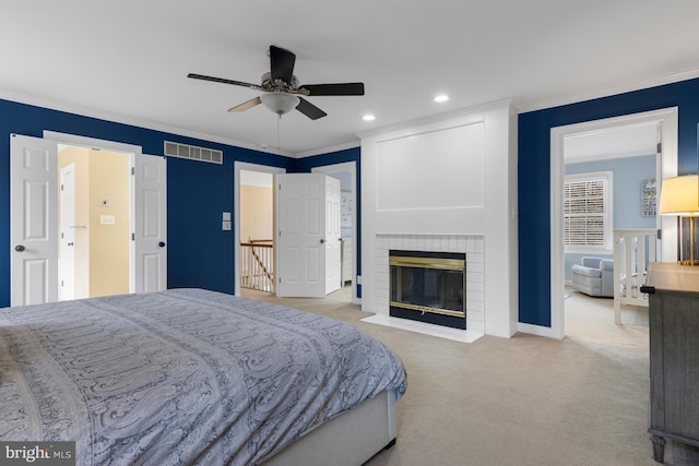 carpeted bedroom with crown molding, recessed lighting, and visible vents