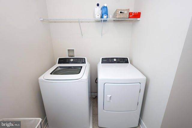 laundry area with washer and clothes dryer