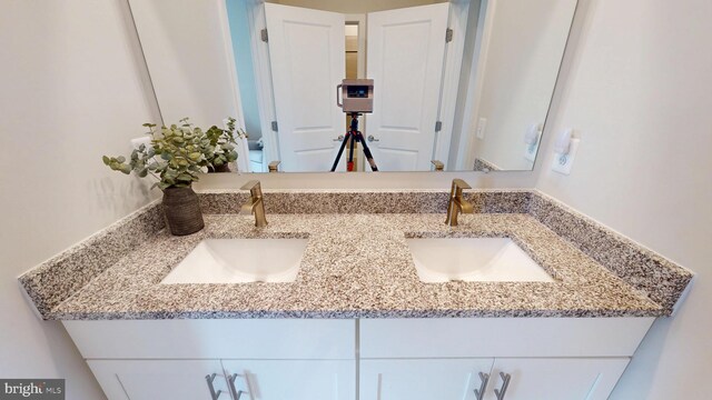 bathroom with double vanity