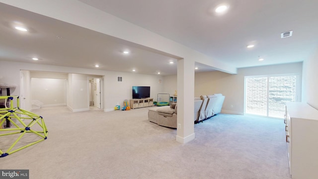 playroom featuring light carpet, recessed lighting, and baseboards