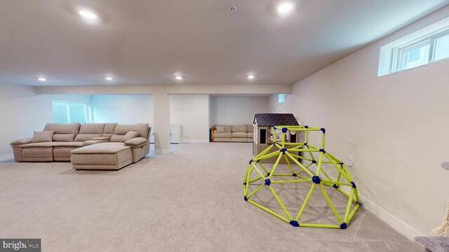 rec room featuring carpet flooring, recessed lighting, and baseboards