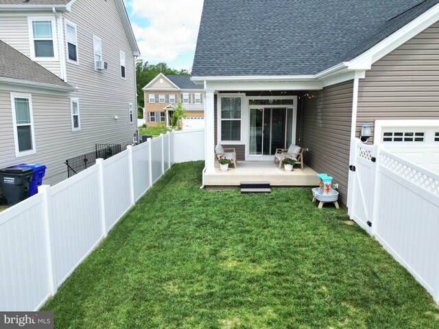 view of yard with a wooden deck and cooling unit
