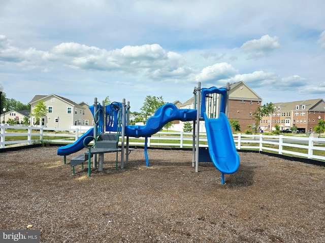 community play area featuring fence