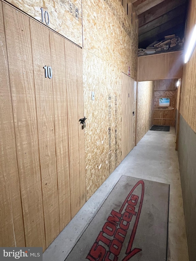 hall with concrete floors