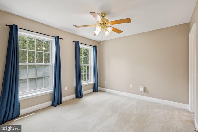 301 Gentle Breeze Cir, Fredericksburg, VA 22406 - empty room featuring plenty of natural light, carpet, and a ceiling fan