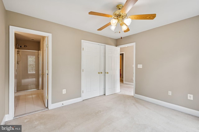 301 Gentle Breeze Cir, Fredericksburg, VA 22406 - unfurnished bedroom featuring carpet floors, a closet, ensuite bath, and ceiling fan