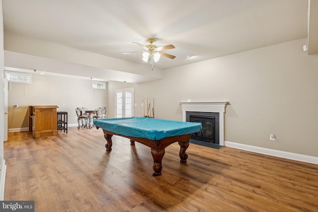 301 Gentle Breeze Cir, Fredericksburg, VA 22406 - recreation room with wood finished floors, ceiling fan, pool table, and a glass covered fireplace