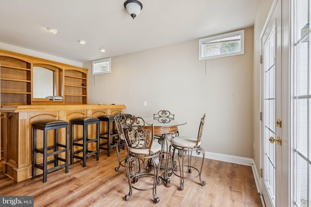 301 Gentle Breeze Cir, Fredericksburg, VA 22406 - dining area with wood finished floors and a bar